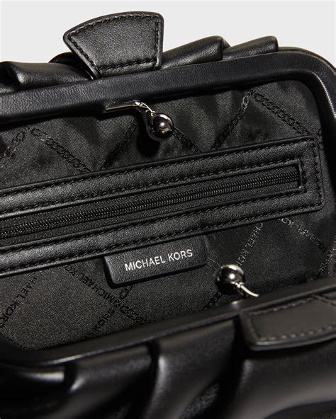 clutch bags michael kors|michael kors nola bag.